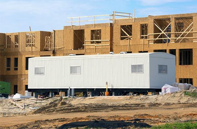 construction workers meeting at office trailers on rent in Englewood